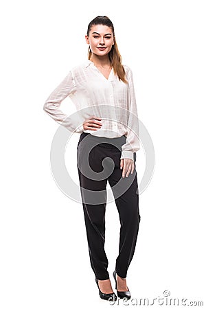 Full length young woman straight long dark hair posing in studio isolated on white background Stock Photo