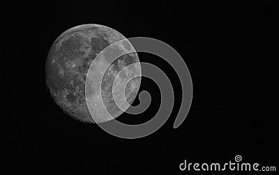 Almost full moon in black sky Stock Photo
