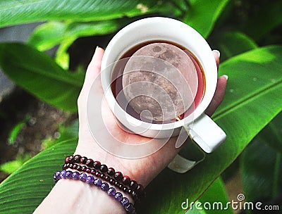 The full moon in a cuppa tea Stock Photo