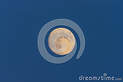 Full Moon in daylight sky Stock Photo