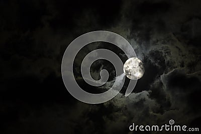 Full moon and eerie white clouds Stock Photo