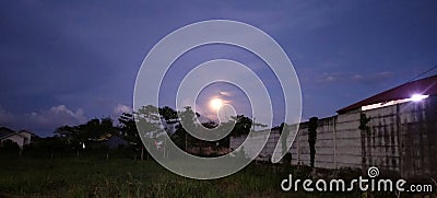 The full moon looks beautiful before midnight Stock Photo