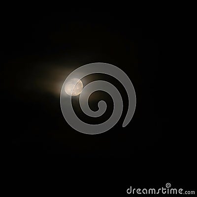 Full moon over dark black sky at night. Mysterious concept with clouds, fog and moon Stock Photo