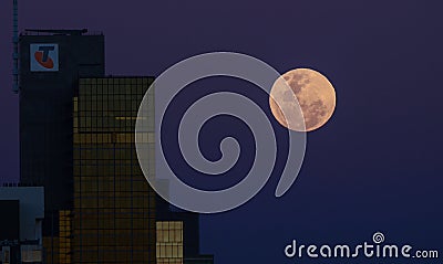 Super moon rise near Modern CBD buildings Stock Photo