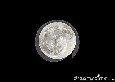 full moon very bright in the black winter sky Stock Photo