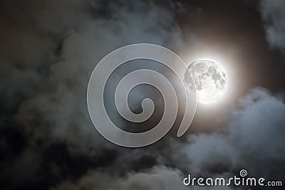 Full moon and white clouds at night Stock Photo