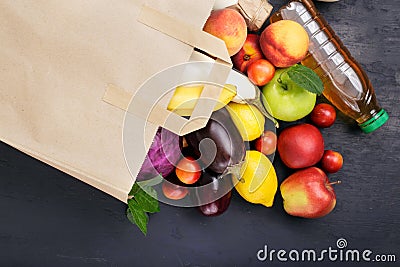 Full paper bag with different food Stock Photo