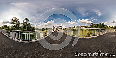 Full seamless spherical panorama 360 by 180 angle view near iron steel frame construction of pedestrian bridge across the river in Stock Photo