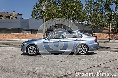Full shot BMW 320D blue. Urban scene. Editorial Stock Photo