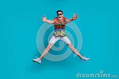 Full size body photo of careless jumping up opened hands missing you guy have fun tropical print shirt isolated on blue Stock Photo