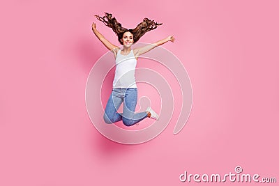 Full size photo of attractive funky lady jumping high up spread hands good mood cheerful sunny day weekend wear white Stock Photo