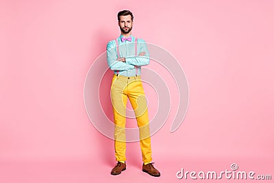 Full size photo of handsome guy trend stylish look red carpet celebrity arms crossed photographing wear shirt suspenders Stock Photo