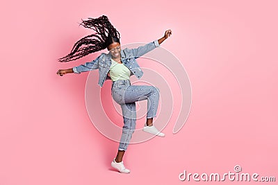 Full size photo of laughing crazy lady dancing fooling around enjoy her hobby isolated on pink color background Stock Photo