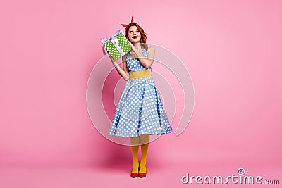 Full size photo of positive cute interested sweet lady get wish desire gift box 8-march holiday wear blue polka-dot Stock Photo