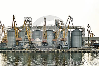 Full-slewing gantry crane in a seaport Stock Photo