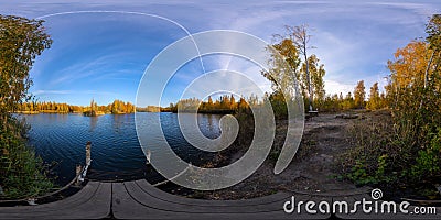 Full spherical 360 by 180 degrees panorama of evening autumnal lake with birch forest on its shores Stock Photo