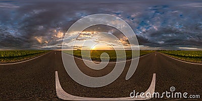 Full spherical seamless hdri panorama 360 degrees angle view on asphalt road among fields in summer evening sunset with awesome Stock Photo