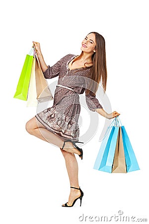 Fullbody portrait of beautiful woman with bags on white Stock Photo