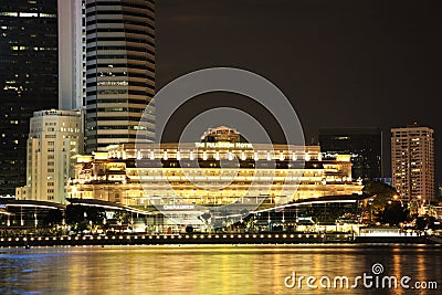 Fullerton Hotel in Singapore at night Editorial Stock Photo