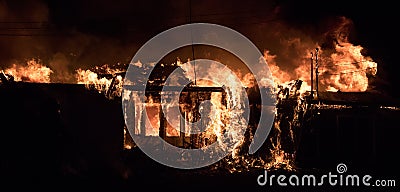 Fully engulfed house fire. Spectacular house fire. Stock Photo