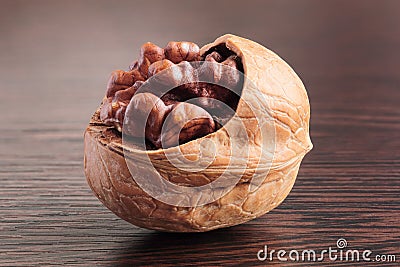 Fully focused walnut. Macro photo of cracked nut Stock Photo