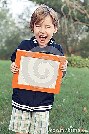 Fun boy with a sign Stock Photo