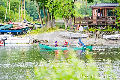 Fun canoeing activity in a small peaceful corner of ullswater Editorial Stock Photo