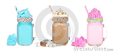 Colorful cotton candy and smores summer milkshakes in mason jars isolated on white Stock Photo