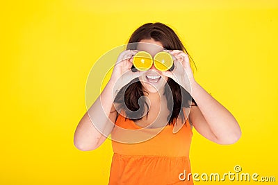Fun Concept Model With Orange Slices For Eyes Stock Photo
