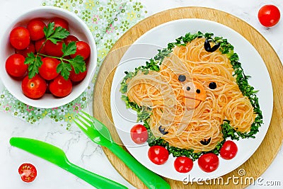 Fun food idea for kids - cute yellow chicken rice noodles Stock Photo