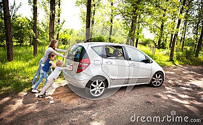 Fun friendly family is on a picnic. A car breakdown. Stock Photo