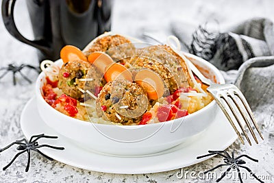 Fun Halloween dinner meatball mouse with ketchup and mashed potatoes, creative idea for children festive food Stock Photo