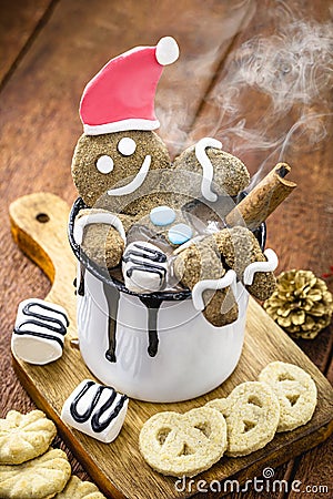 Fun homemade Christmas cookie with steaming hot chocolate, background for happy christmas Stock Photo