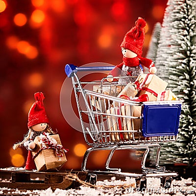 Fun little Christmas dolls doing their shopping Stock Photo