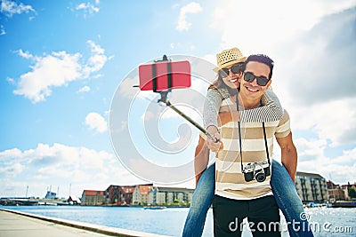 Fun loving young tourists taking a selfie Stock Photo