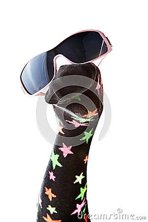 Fun woollen sock puppet with stars and sunglasses Stock Photo