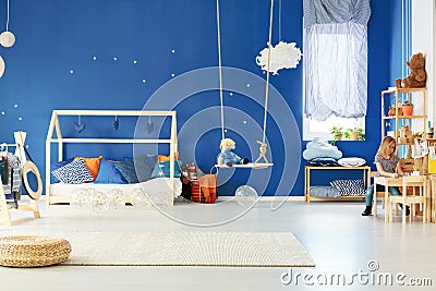 Functional child room with swing Stock Photo