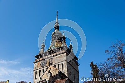 Functional medieval clock on the tower with moving hand carved wood dolls. Editorial Stock Photo