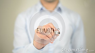 Funding, Man writing on transparent screen Stock Photo