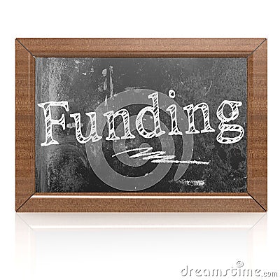 Funding text written on blackboard Stock Photo