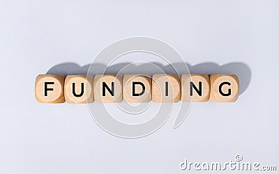 Funding word on wooden block Stock Photo