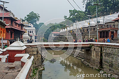 Funeral procession near the holy river at the hindu temple Editorial Stock Photo