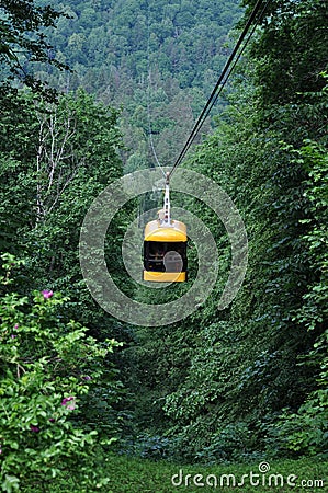 Funicular tram takes people across the glen. Stock Photo