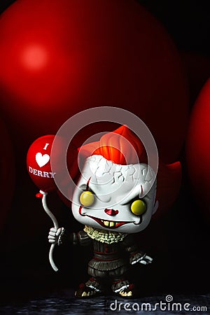 Funko POP vinyl figure of Pennywise with balloon from the movie It Editorial Stock Photo