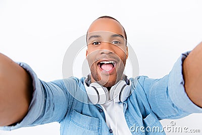 Funky swag selfie! Young african teen hipster is taking selfie s Stock Photo