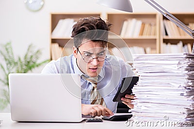 The funny accountant bookkeeper working in the office Stock Photo