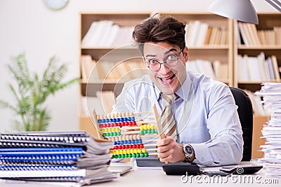 The funny accountant bookkeeper working in the office Stock Photo