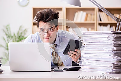 The funny accountant bookkeeper working in the office Stock Photo