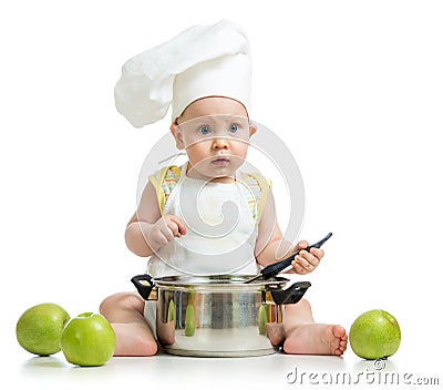 Funny adorable baby with green apples Stock Photo