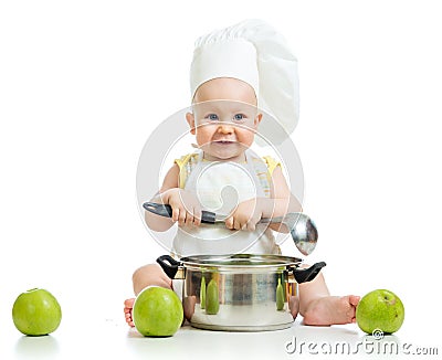 Funny adorable baby with green apples Stock Photo